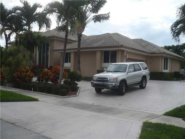 761 Northeast 77th Street Boca Raton, FL 33487 - Photo 2 of 17 Exterior Front