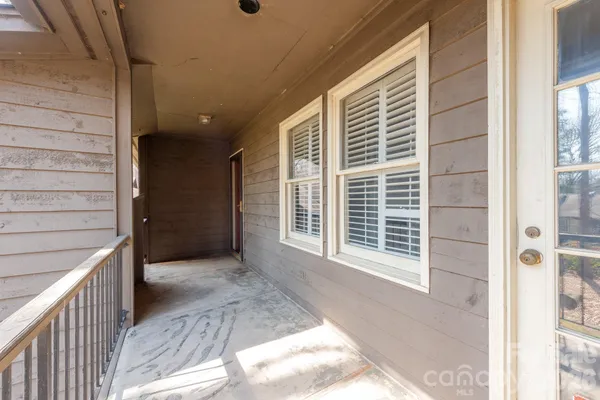 a view of a porch of a house