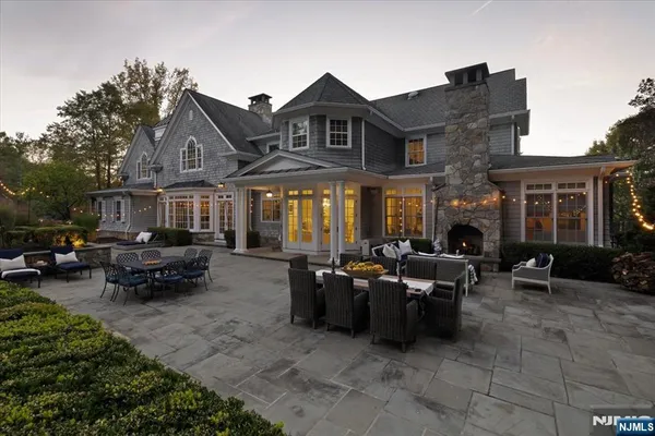 a view of a patio with couches table and chairs