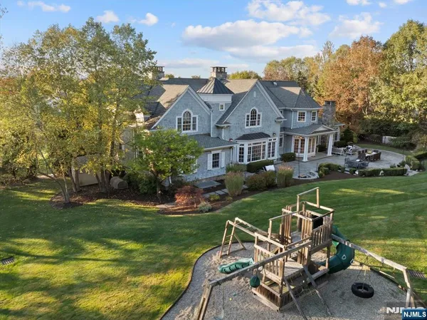 a view of a house with a big yard