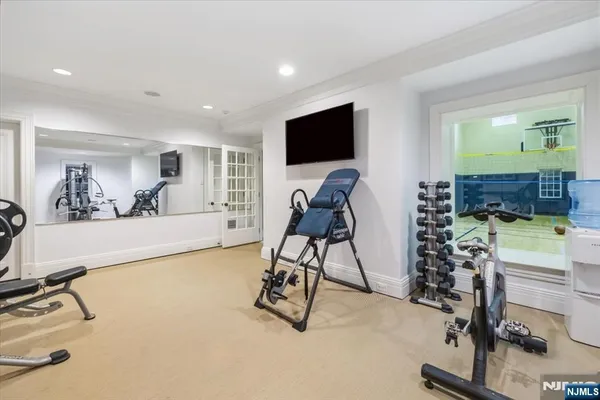 a view of a livingroom with furniture and a flat screen tv