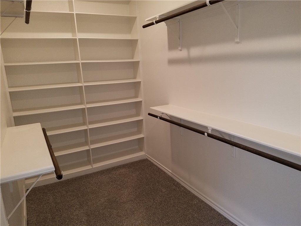 7202 Bryson Way Corpus Christi, TX 78414 - Photo 8 of 12 a view of an empty walk in closet