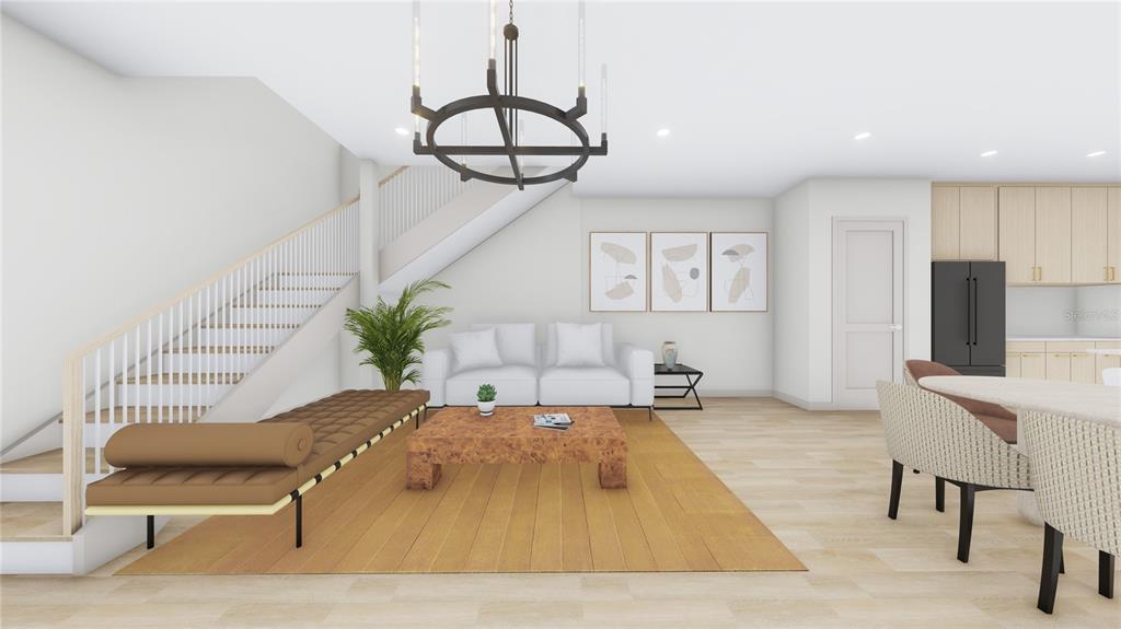 1505 West Arch Street, Unit 1 Tampa, FL 33607 - Photo 11 of 27 a living room with furniture and a chandelier