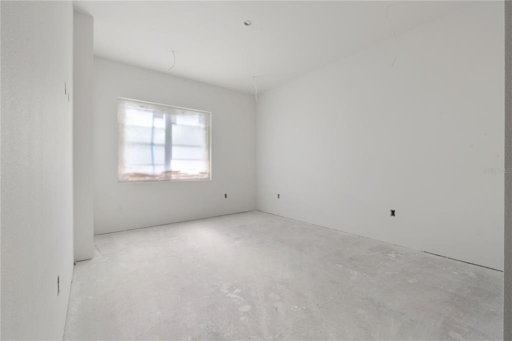 1505 West Arch Street, Unit 1 Tampa, FL 33607 - Photo 18 of 27 an empty room with windows