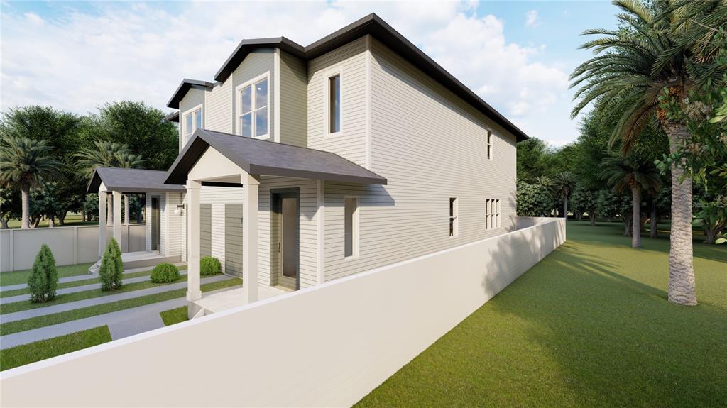 1505 West Arch Street, Unit 1 Tampa, FL 33607 - Photo 4 of 27 front view of a house with a yard