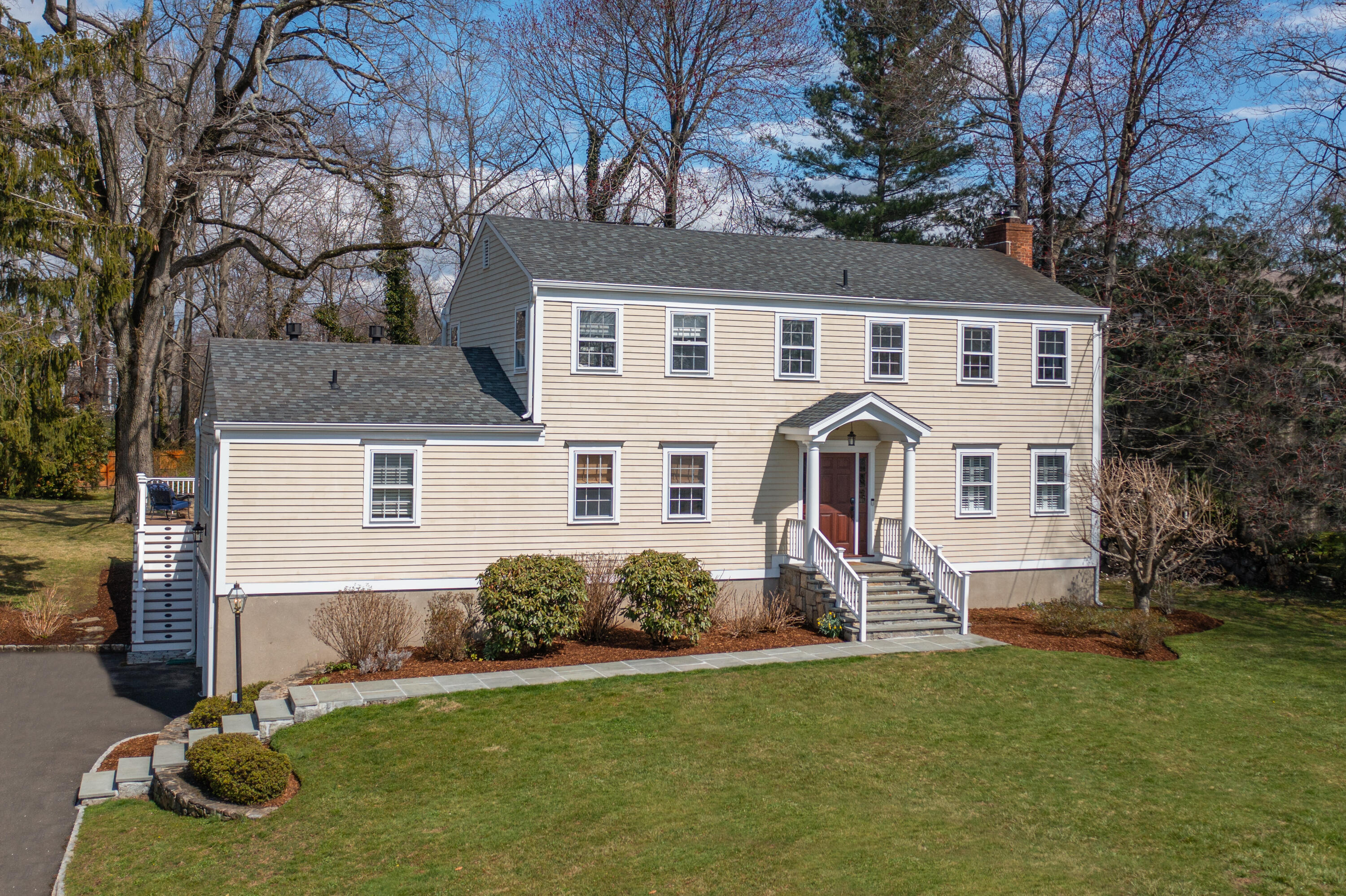 a front view of a house with a yard