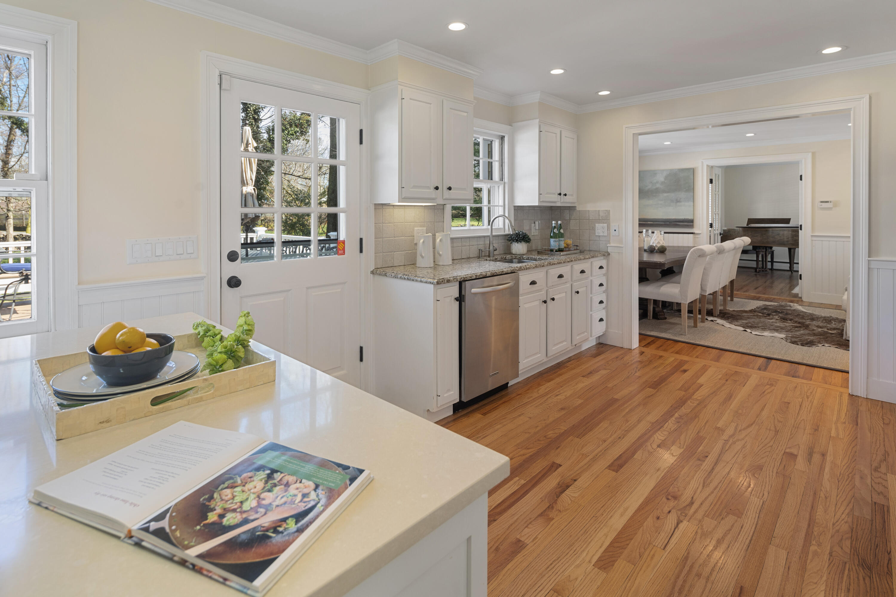 9 Duffy's Lane Darien, CT 06820 - Photo 15 of 42 a kitchen with granite countertop a stove a sink a refrigerator and wooden floor