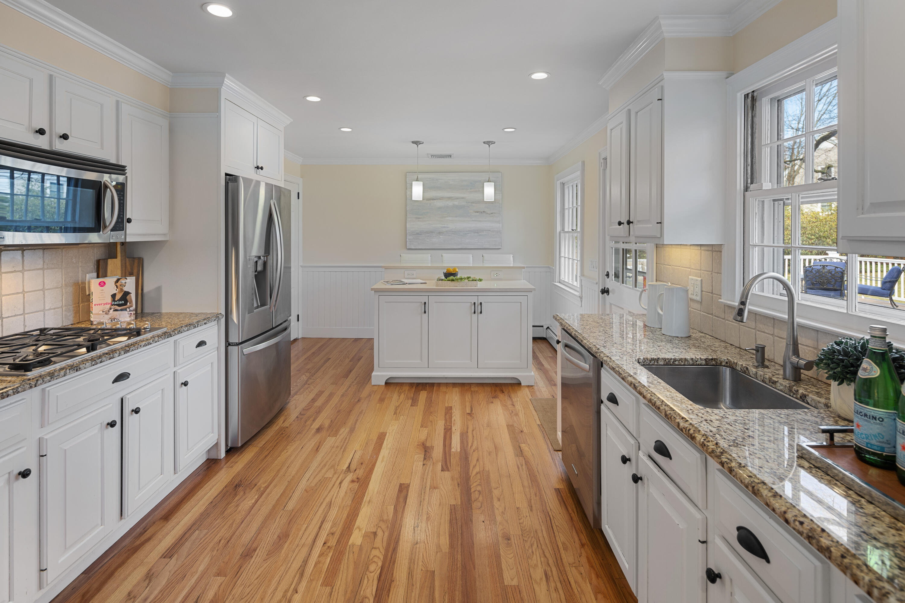 9 Duffy's Lane Darien, CT 06820 - Photo 16 of 42 a large kitchen with stainless steel appliances granite countertop a lot of counter space and wooden floors