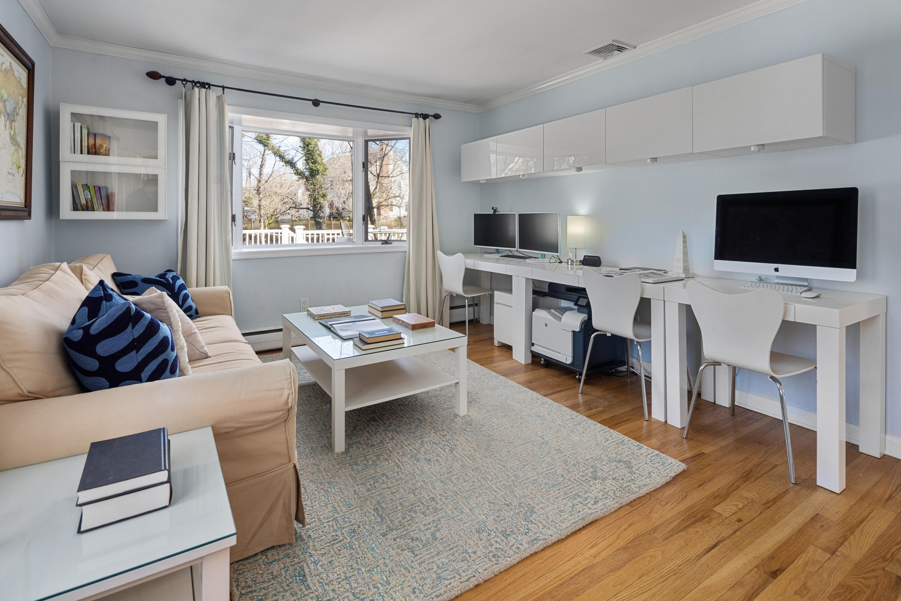 9 Duffy's Lane Darien, CT 06820 - Photo 19 of 42 a living room with furniture a flat screen tv and a fireplace