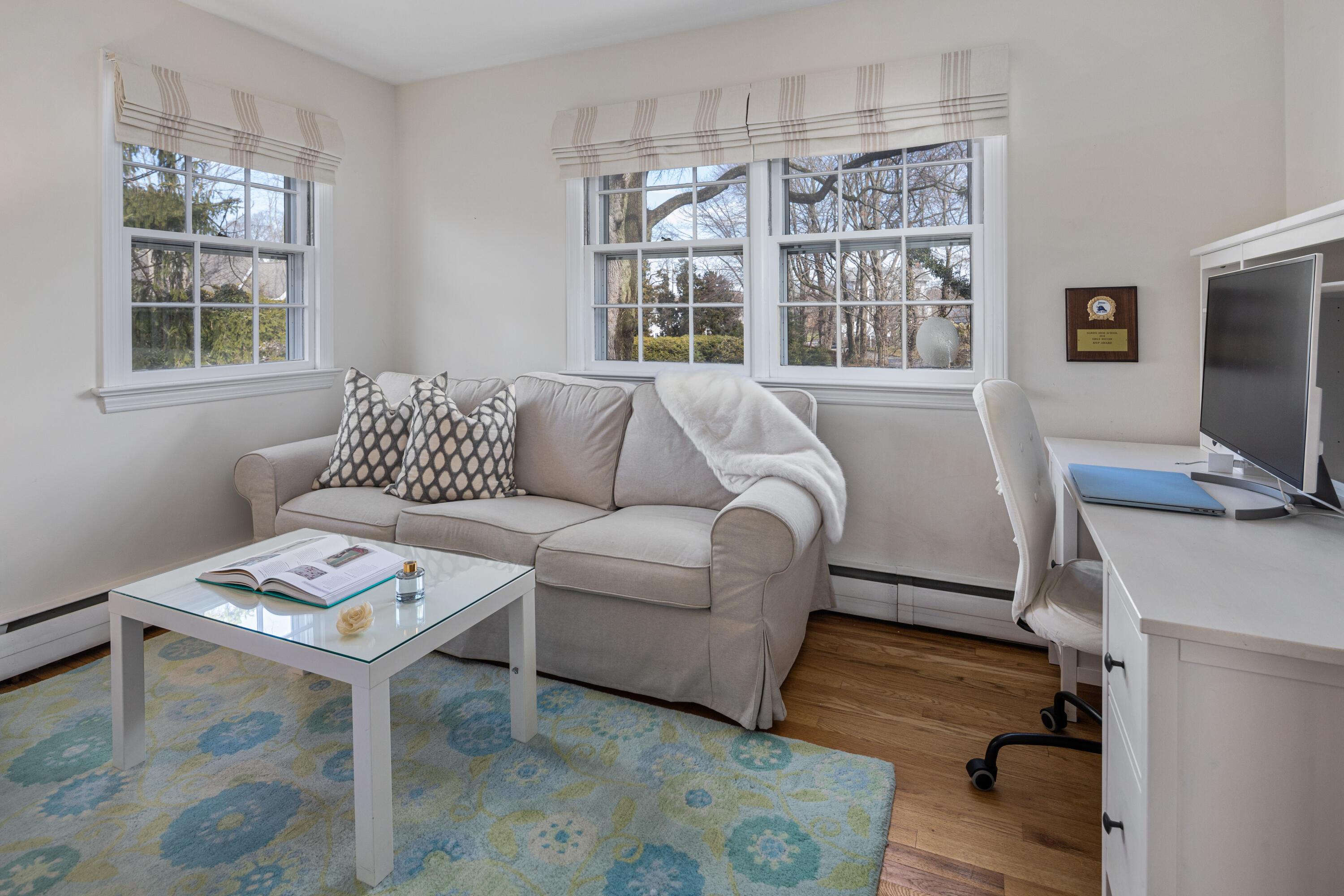 9 Duffy's Lane Darien, CT 06820 - Photo 27 of 42 a living room with furniture a flat screen tv and a window