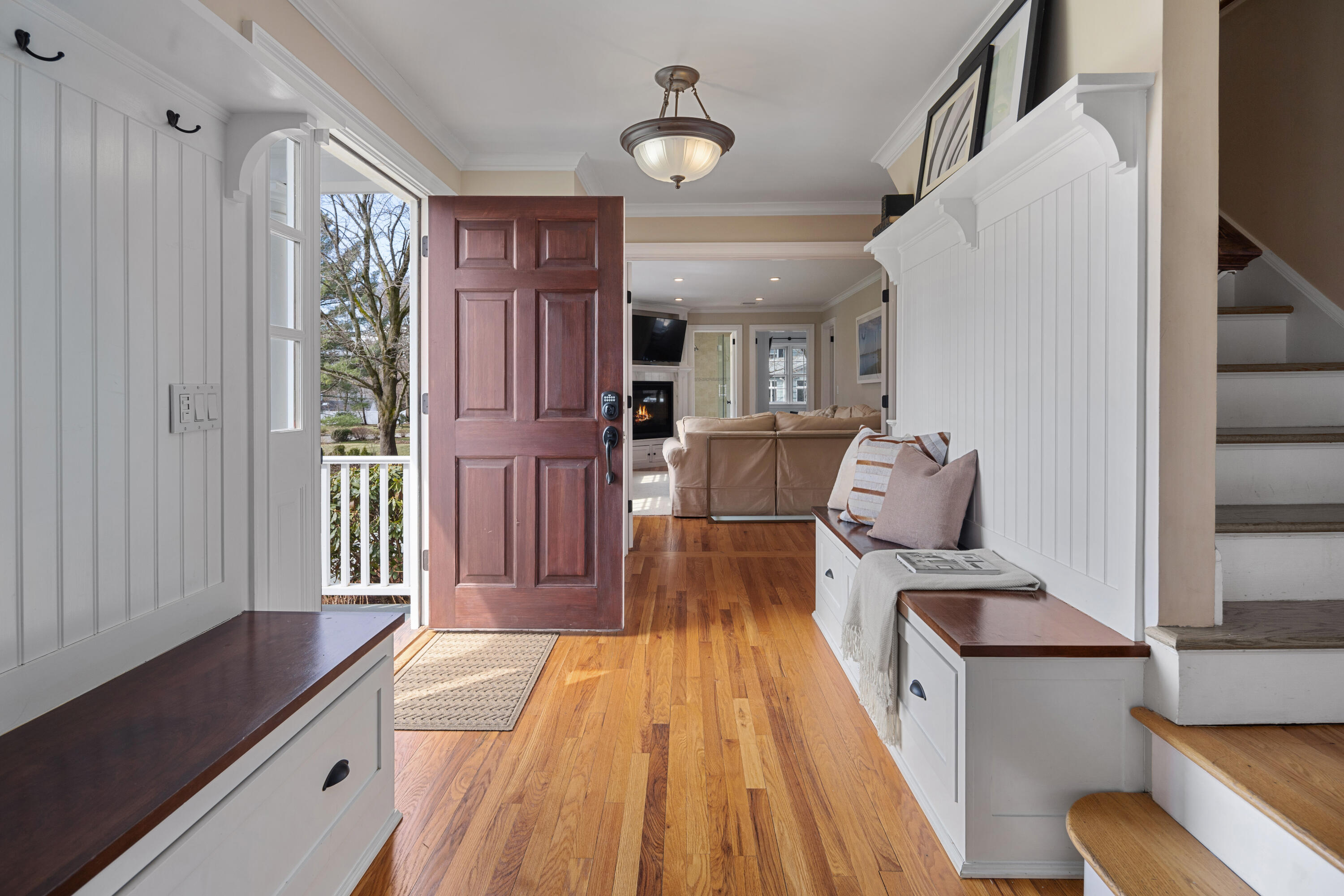 9 Duffy's Lane Darien, CT 06820 - Photo 7 of 42 a living room with furniture and a fireplace