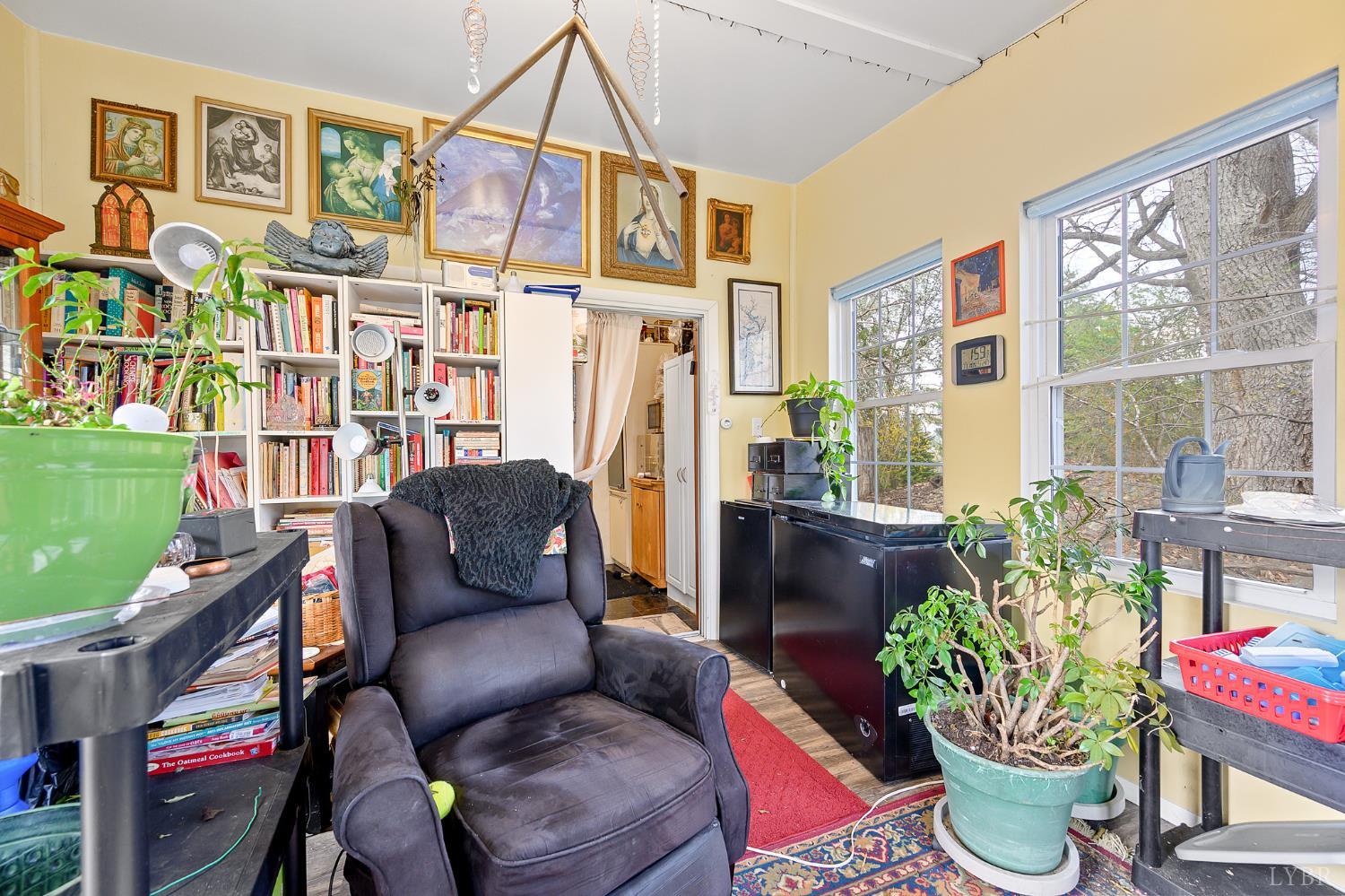 4400 Murray Hollow Road Thaxton, VA 24174 - Photo 21 of 56 a living room with furniture and a potted plant