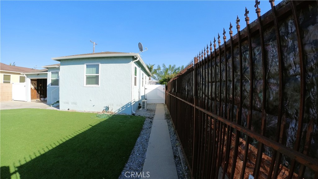 1808 North Grape Avenue Compton, CA 90222 - Photo 11 of 35 a view of a house with backyard