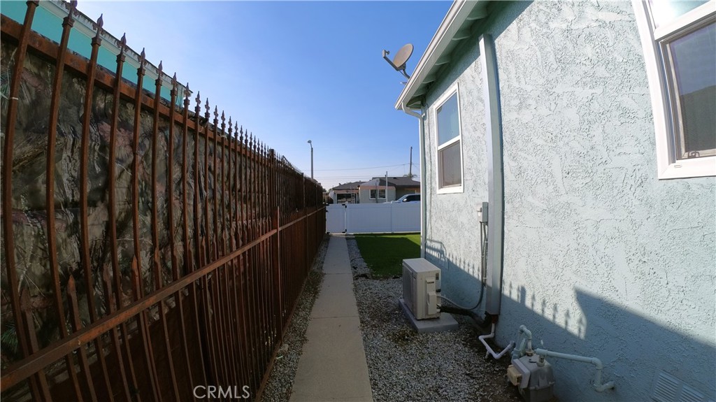 1808 North Grape Avenue Compton, CA 90222 - Photo 12 of 35 a view of a pathway of a building from a balcony