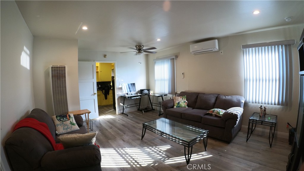 1808 North Grape Avenue Compton, CA 90222 - Photo 21 of 35 a living room with furniture and a window