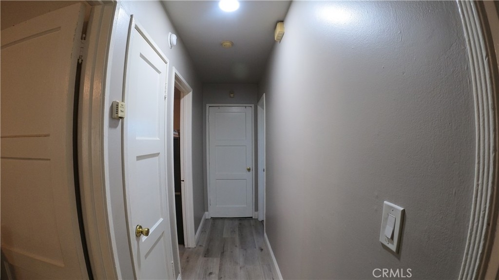 1808 North Grape Avenue Compton, CA 90222 - Photo 24 of 35 a view of hallway with wooden floor