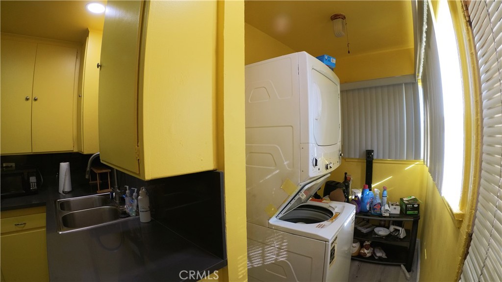 1808 North Grape Avenue Compton, CA 90222 - Photo 27 of 35 a bathroom with a sink and a mirror