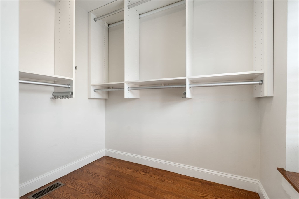 10 Bartlett Street Boston, MA 02129 - Photo 18 of 34 a view of an empty walk in closet