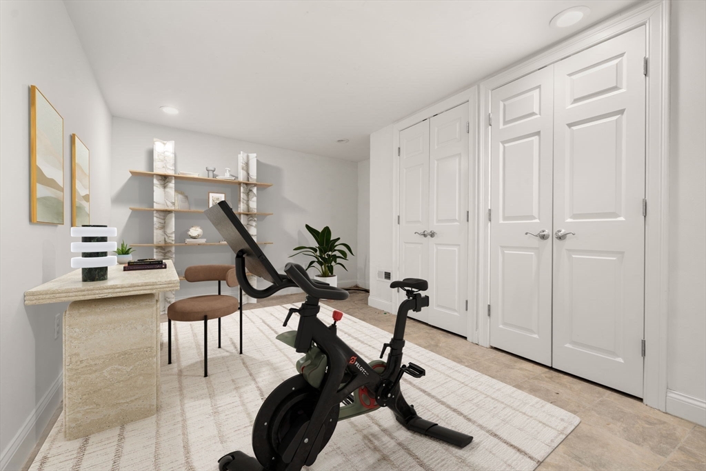 10 Bartlett Street Boston, MA 02129 - Photo 22 of 34 a view of a room with gym equipment
