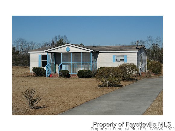 6237 Sandy Creek Road Stedman, NC 28391 - Photo 1 of 17 a black and white photo of a house