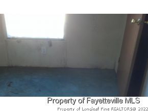 6237 Sandy Creek Road Stedman, NC 28391 - Photo 14 of 17 a black and white photo of a room