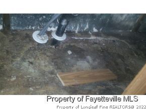 6237 Sandy Creek Road Stedman, NC 28391 - Photo 5 of 17 a picture of a room