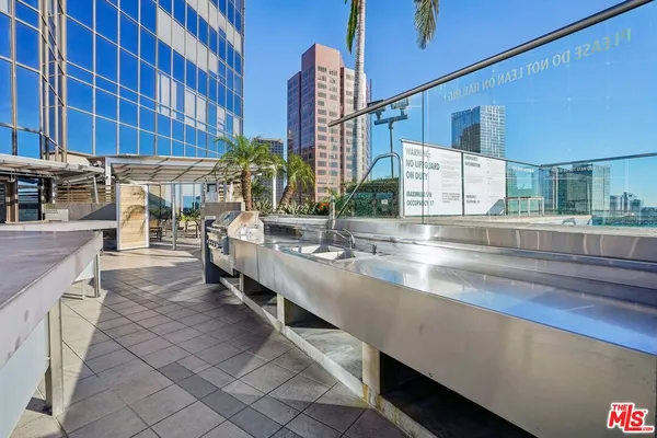 a view of swimming pool from a balcony