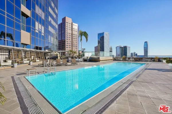 a view of a swimming pool and an ocean view
