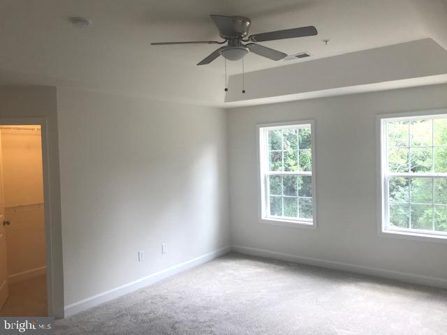 8363 WB&A Road Severn, MD 21144 - Photo 15 of 32 an empty room with windows and fan