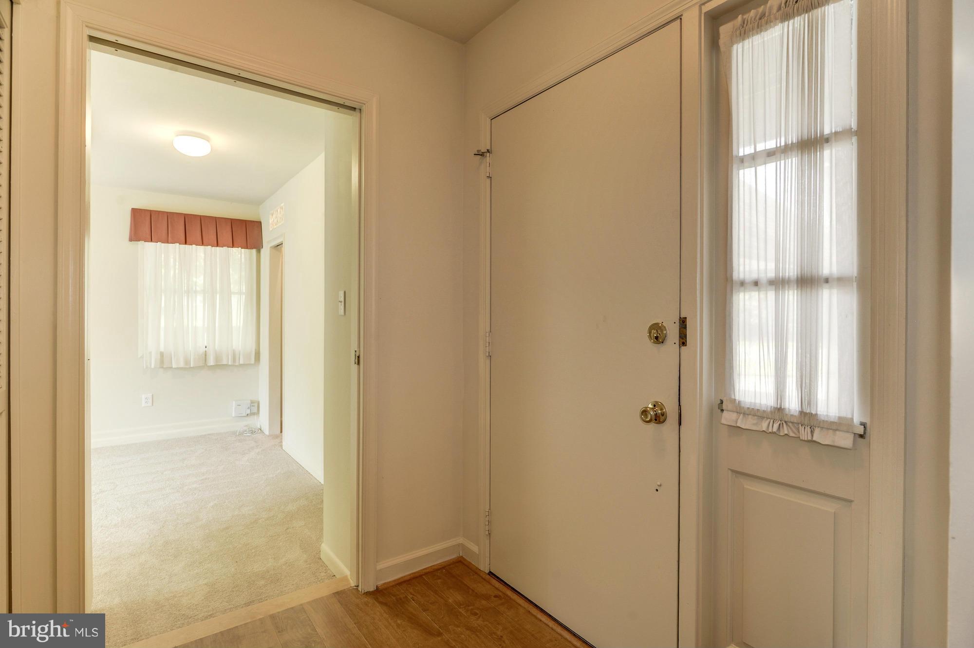 613 Edwards Road Annapolis, MD 21409 - Photo 3 of 28 a view of a bathroom with a glass door