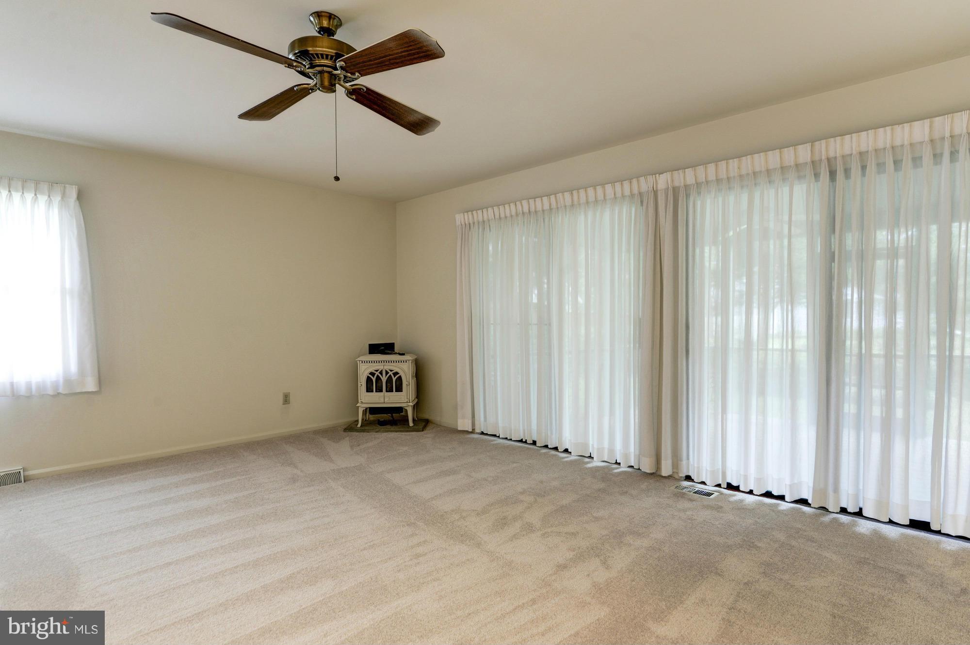 613 Edwards Road Annapolis, MD 21409 - Photo 4 of 28 a view of an empty room and a window