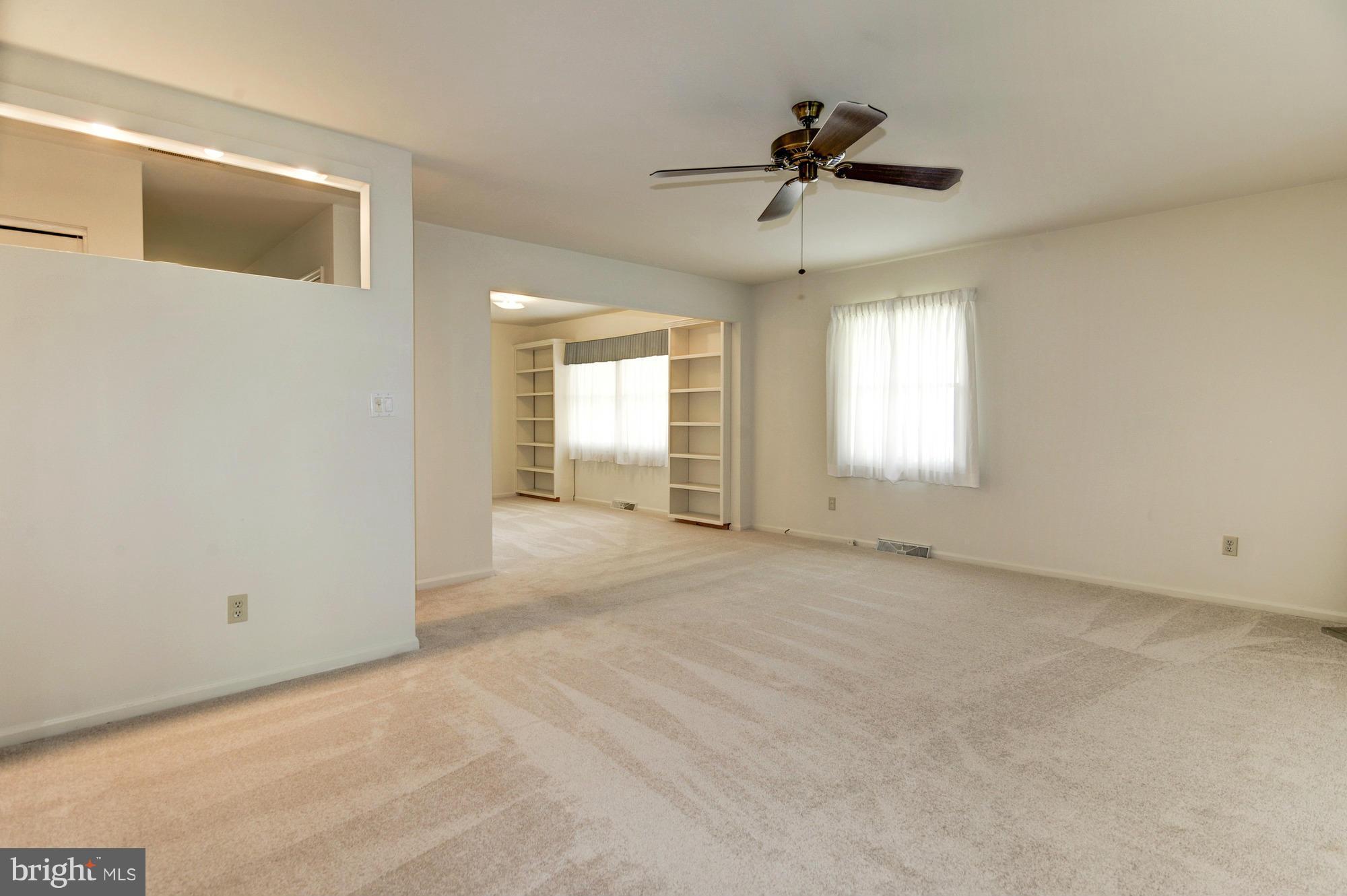 613 Edwards Road Annapolis, MD 21409 - Photo 5 of 28 a view of an empty room with a window