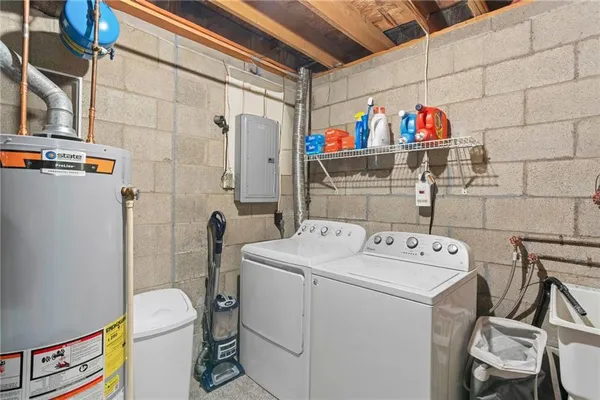 a utility room with dryer and washer