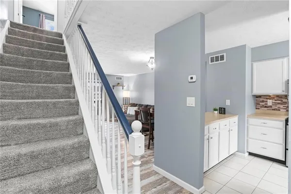 a view of an entryway with staircase