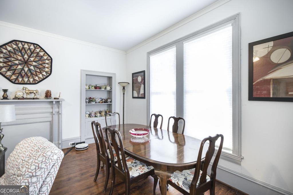 169 West Dykes Street Cochran, GA 31014 - Photo 8 of 34 a view of a dining room with furniture window and wooden floor