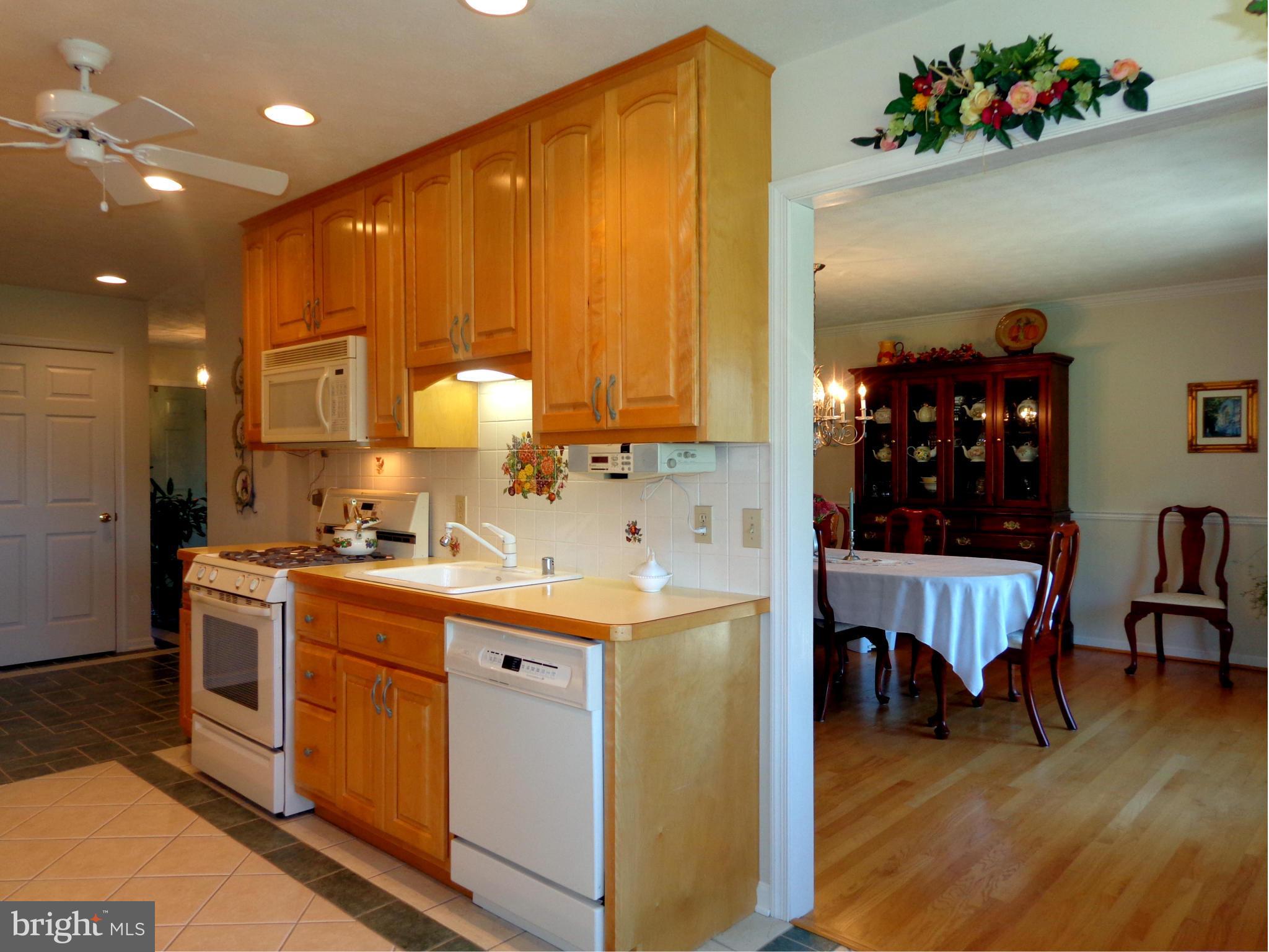 2396 Cross Section Road Westminster, MD 21158 - Photo 14 of 30 Kitchen opening to Dining Room