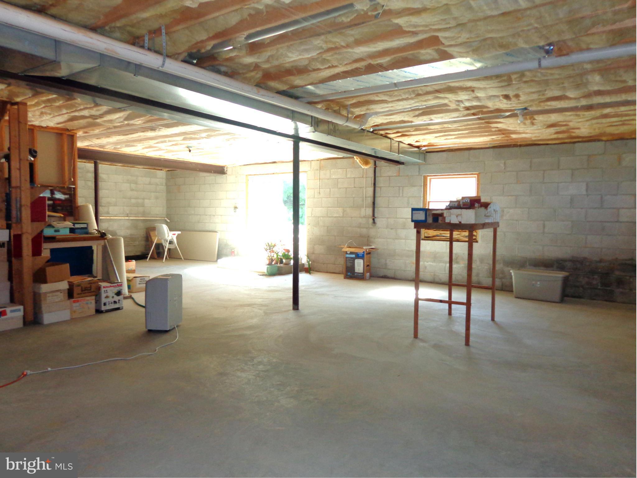 2396 Cross Section Road Westminster, MD 21158 - Photo 27 of 30 Huge Unfinished Basement with Andersen Slider