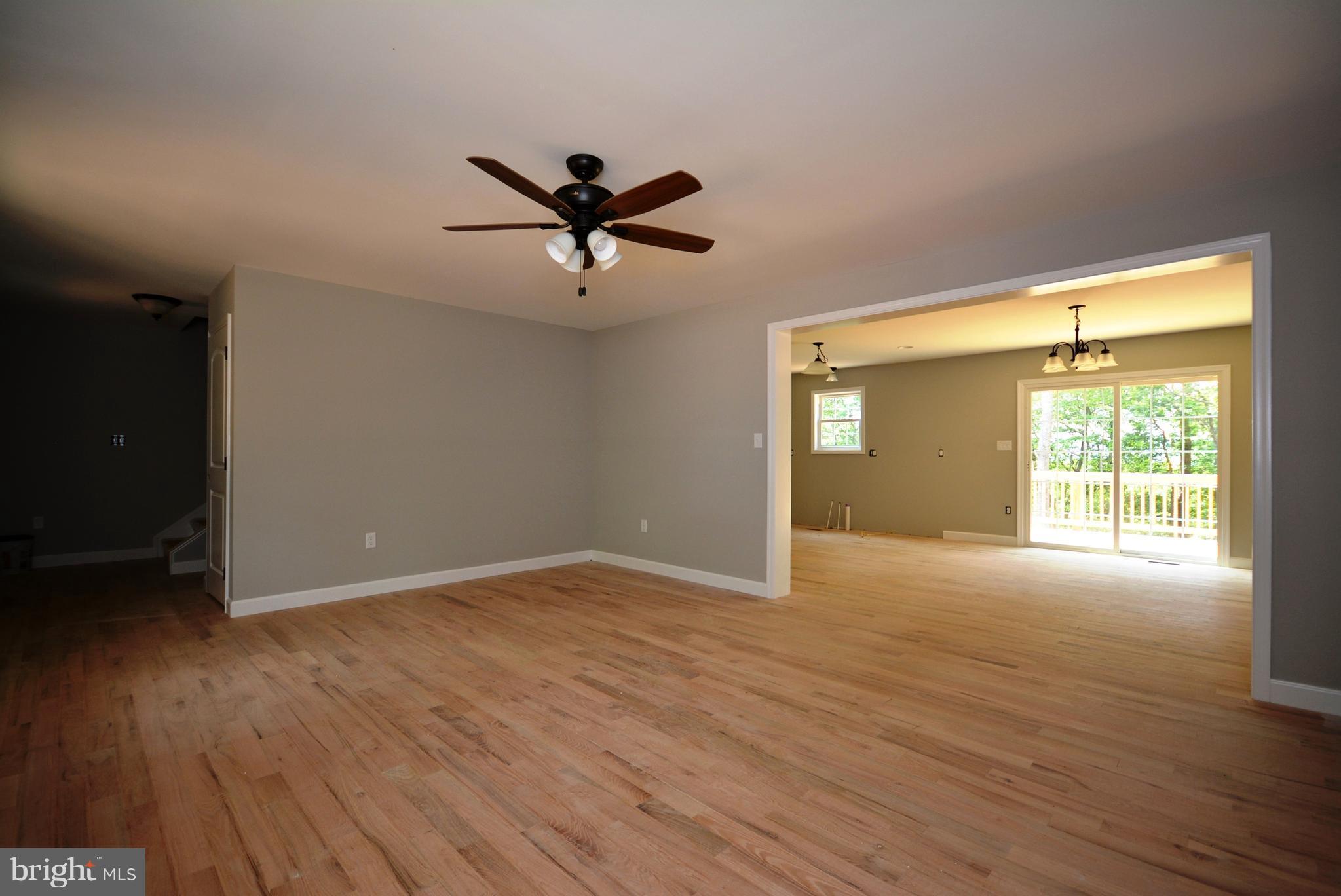 155 Lower View Road Strasburg, VA 22657 - Photo 12 of 30 a view of empty room with wooden floor and fan