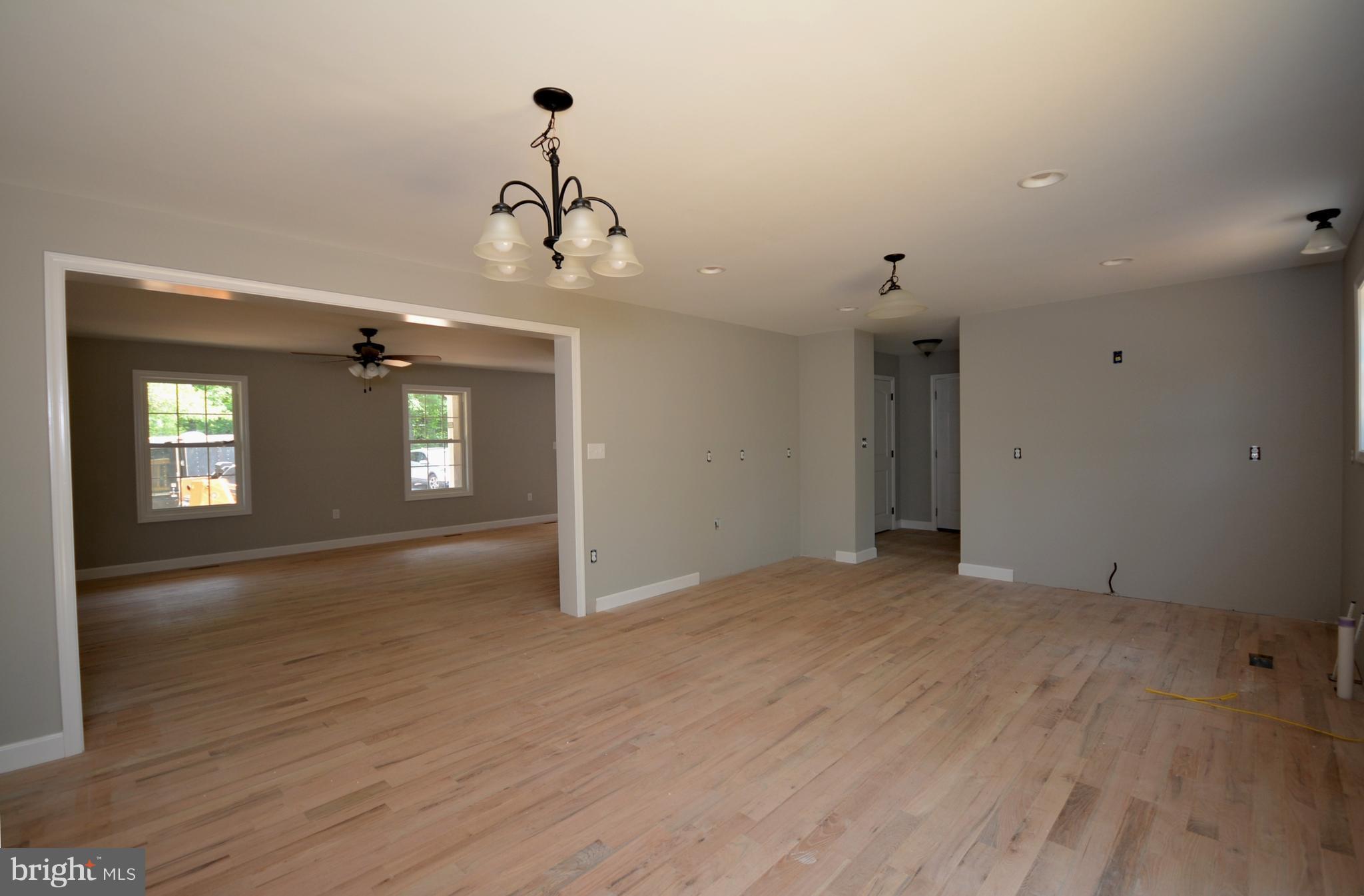 155 Lower View Road Strasburg, VA 22657 - Photo 16 of 30 a view of empty room with window and wooden floor