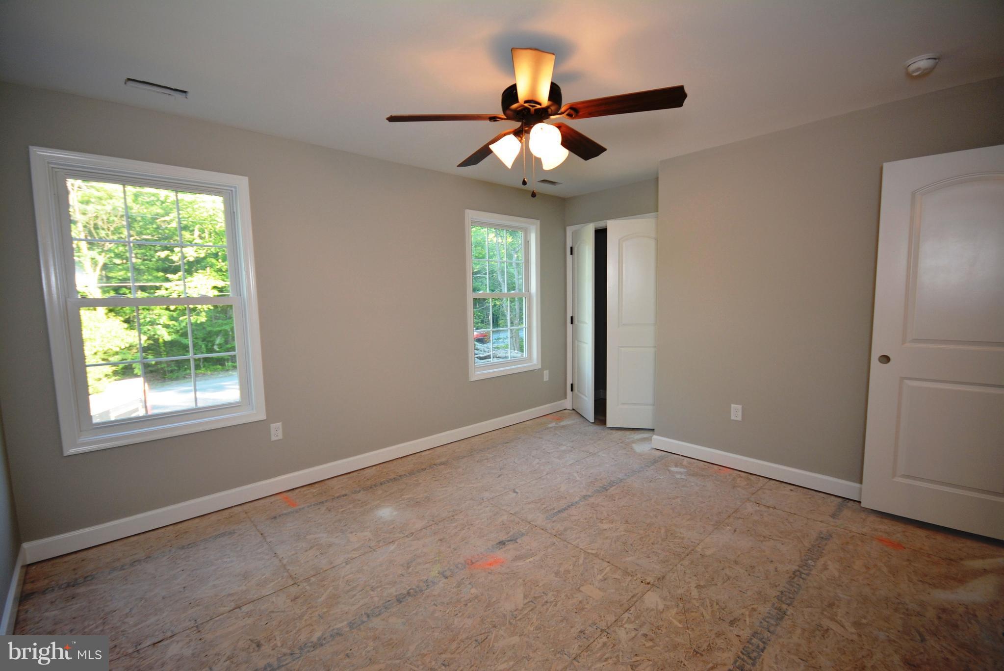 155 Lower View Road Strasburg, VA 22657 - Photo 22 of 30 a view of an empty room with a window