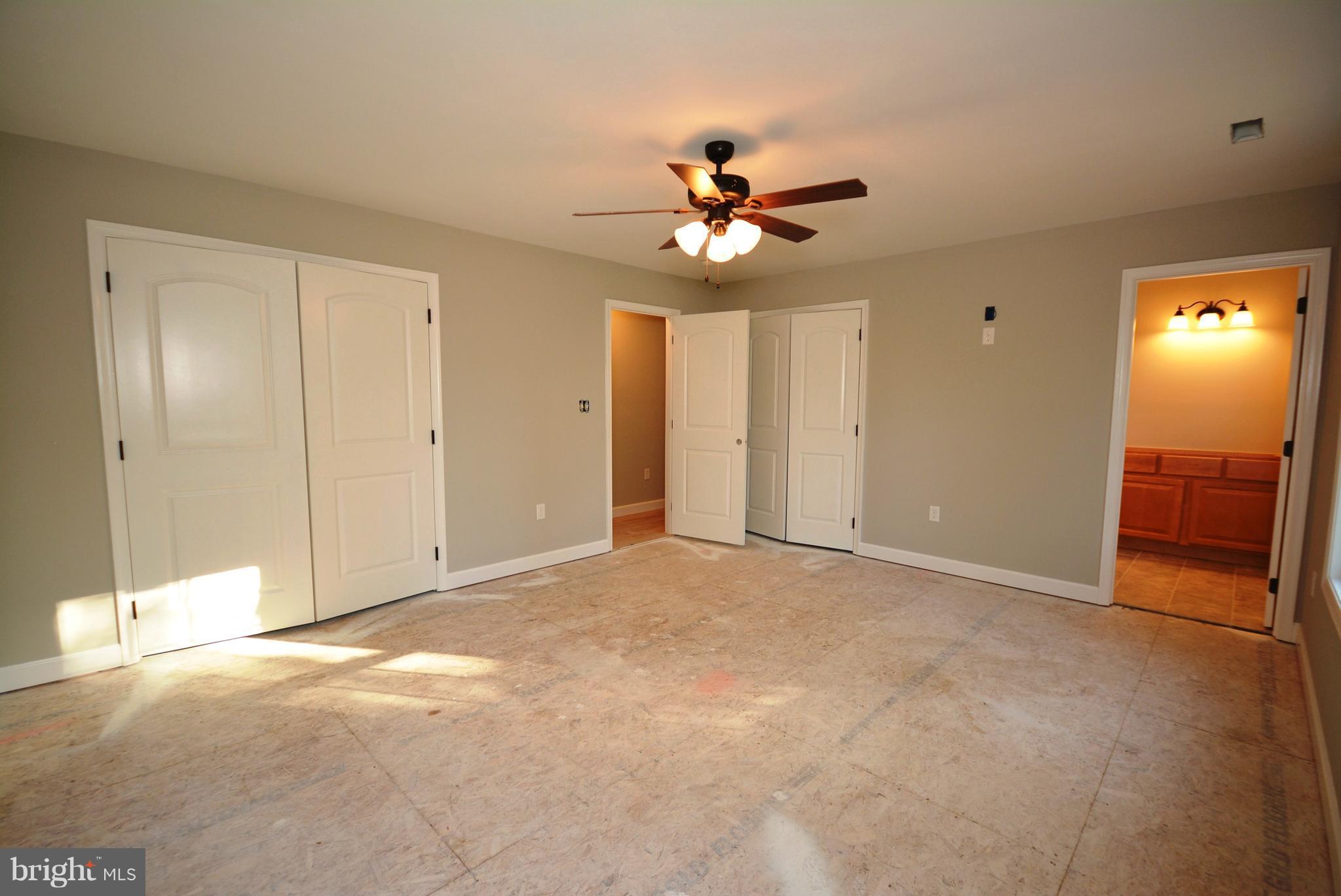 155 Lower View Road Strasburg, VA 22657 - Photo 26 of 30 a view of an empty room with a ceiling fan