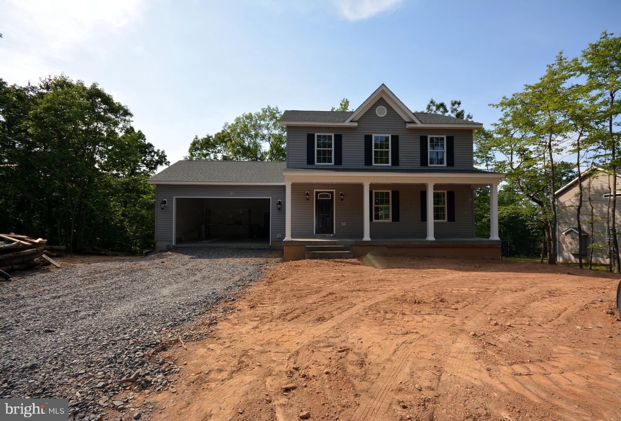 155 Lower View Road Strasburg, VA 22657 - Photo 29 of 30 a front view of a house with a yard and a garage