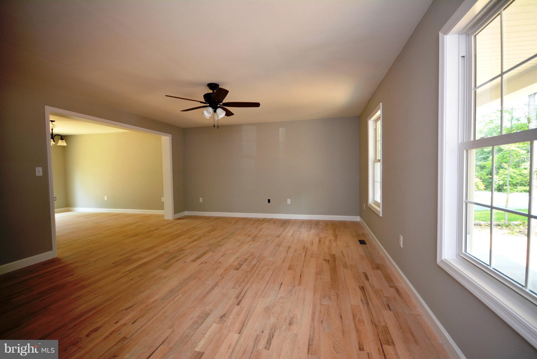 155 Lower View Road Strasburg, VA 22657 - Photo 10 of 30 wooden floor in an empty room with a window