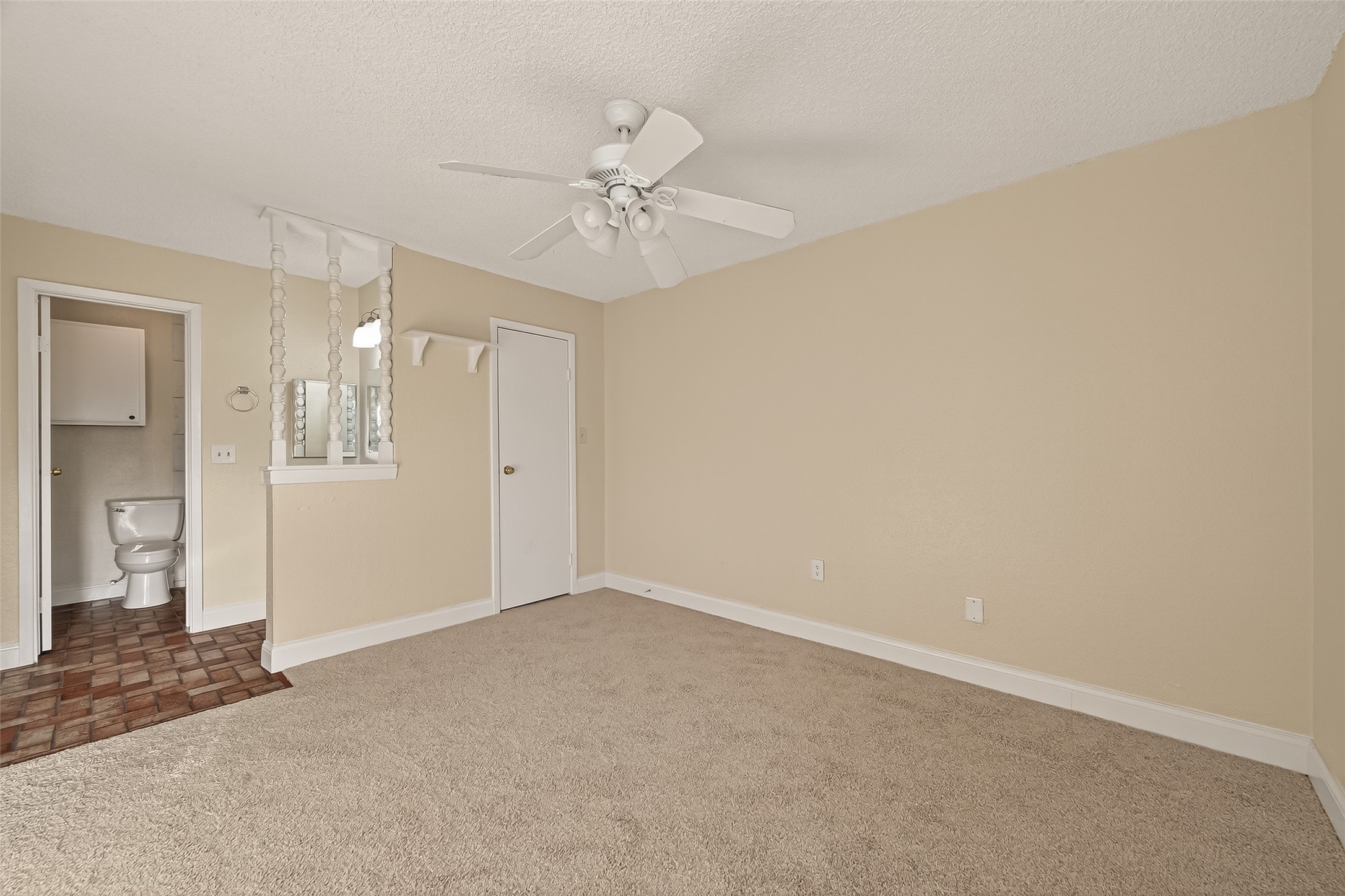 1500 Bay Area Boulevard, Unit 183 Houston, TX 77058 - Photo 18 of 24 an empty room with fan and entrance