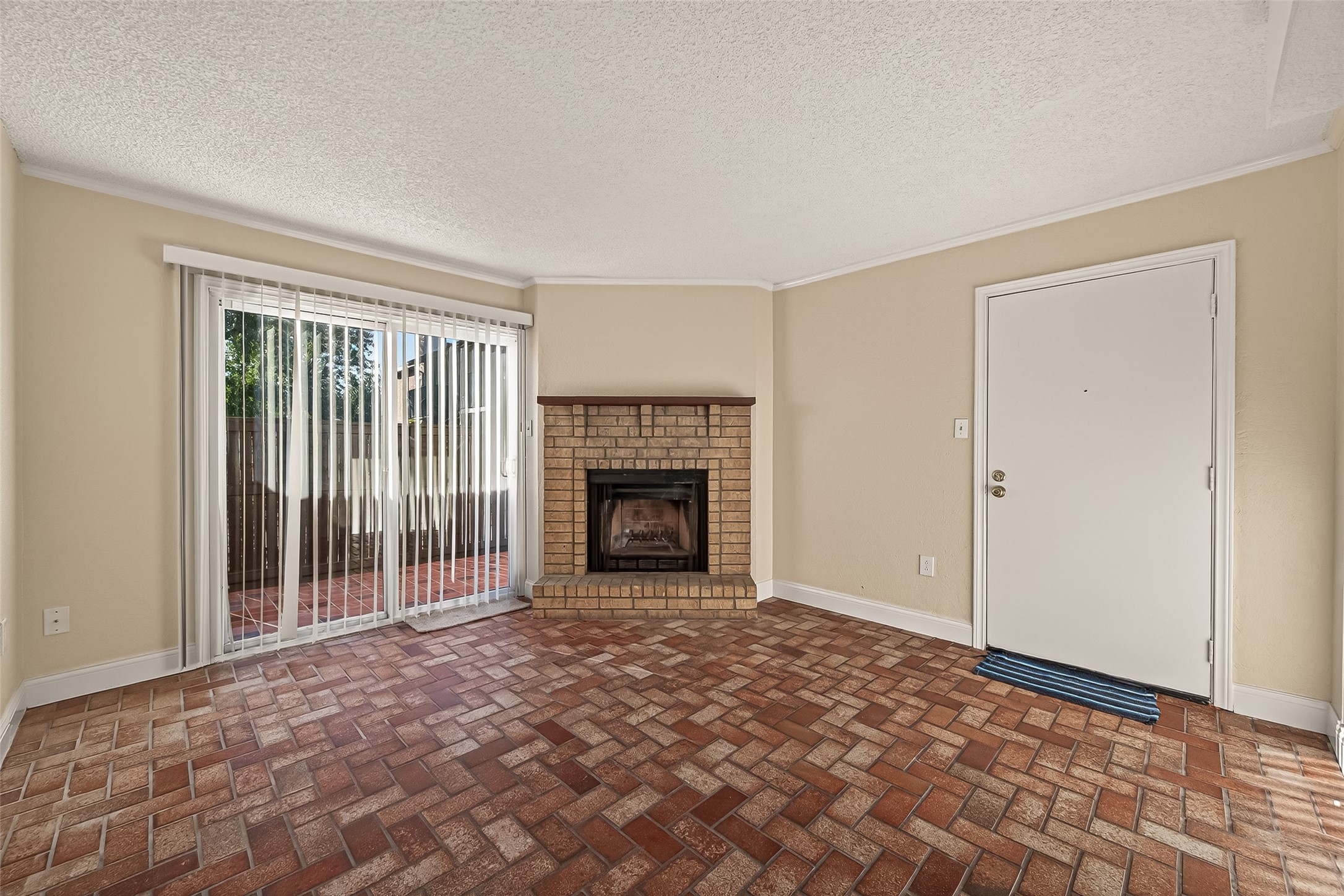 1500 Bay Area Boulevard, Unit 183 Houston, TX 77058 - Photo 3 of 24 a view of a livingroom with a fireplace