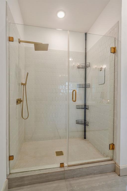 1909 Willowcrest Loop Denton, TX 76205 - Photo 22 of 40 Bathroom with a stall shower