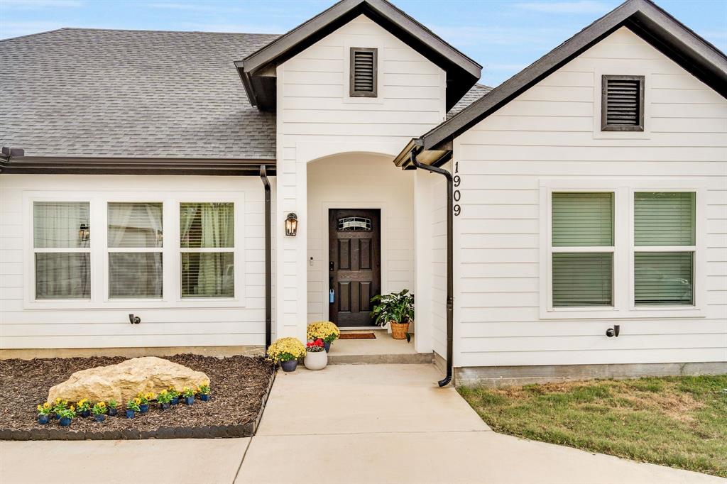 1909 Willowcrest Loop Denton, TX 76205 - Photo 3 of 40 Welcoming covered porch, entry!