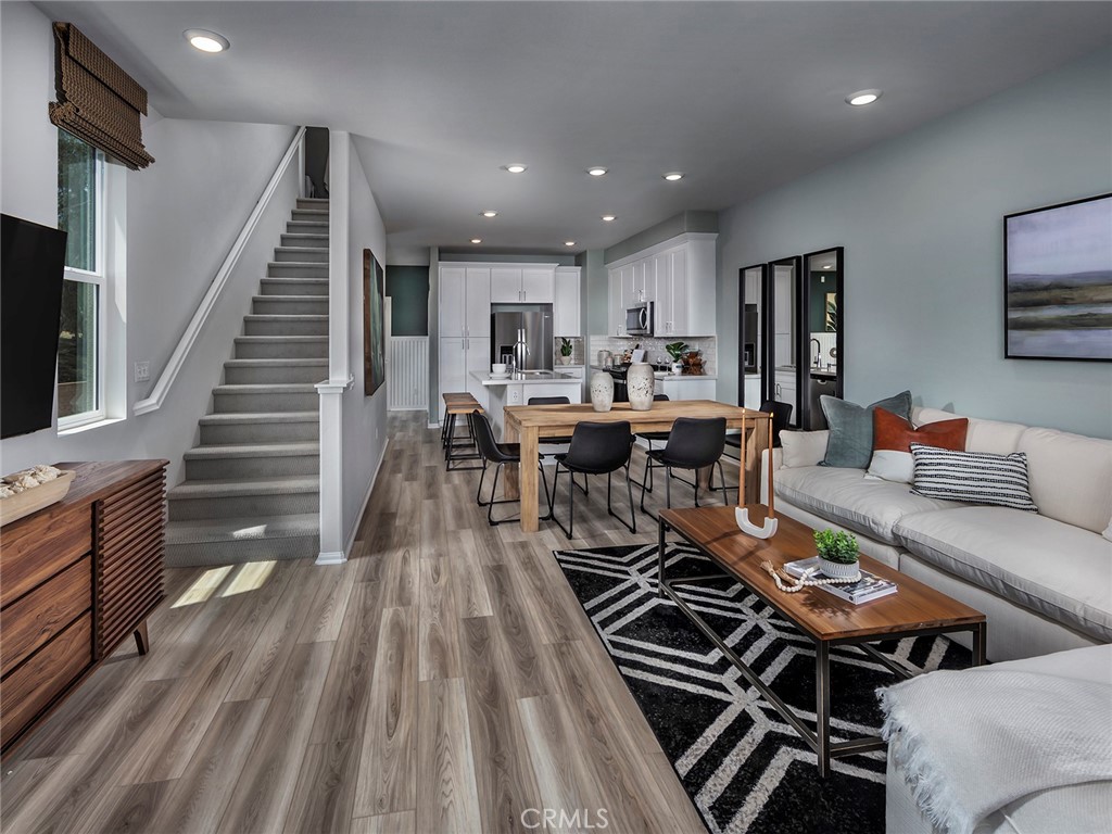 4893 Merida Way Oceanside, CA 92057 - Photo 5 of 51 Photo is not of the actual home, but is an inspirational photo of builder’s model home and may depict options, furnishings, and/or decorator features that are not included