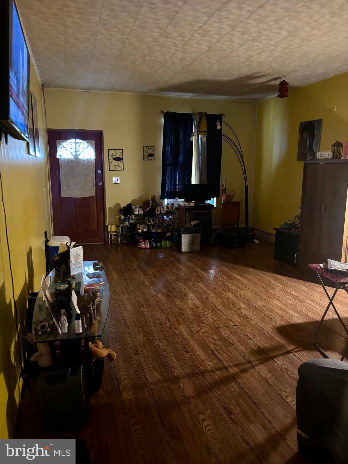 538 North Front Street Steelton, PA 17113 - Photo 3 of 6 a living room with furniture and a mirror
