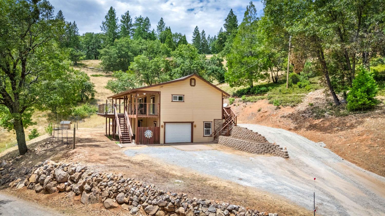 6021 Starkes Grade Road Pollock Pines, CA 95726 - Photo 1 of 42 Situated for privacy with easy access to both levels of the home.